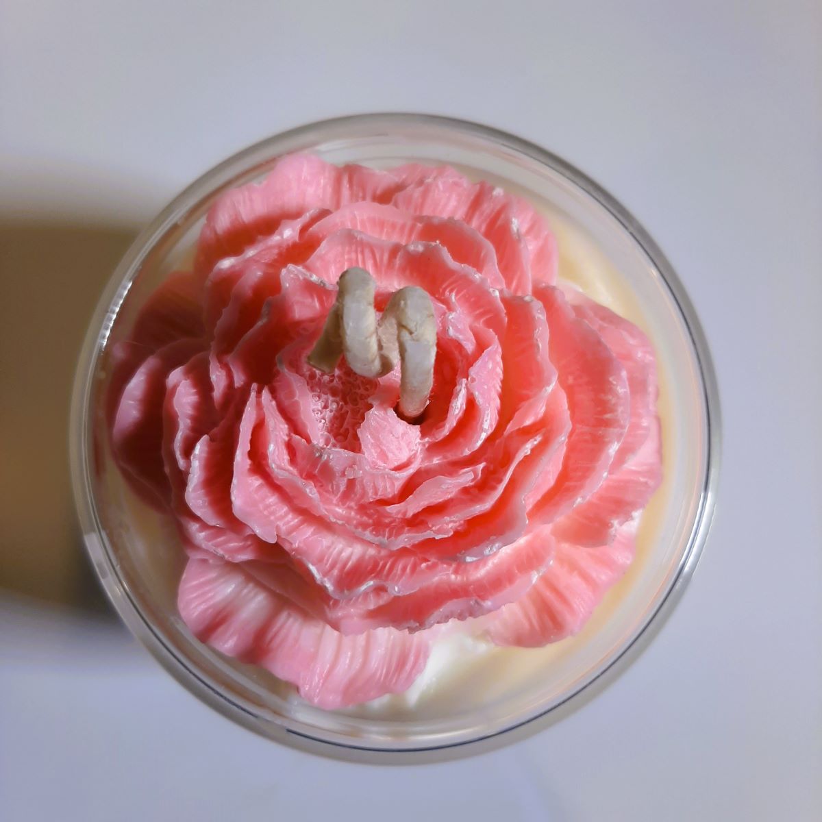 Closeup of top of Flower candle - with peony wax flower on top